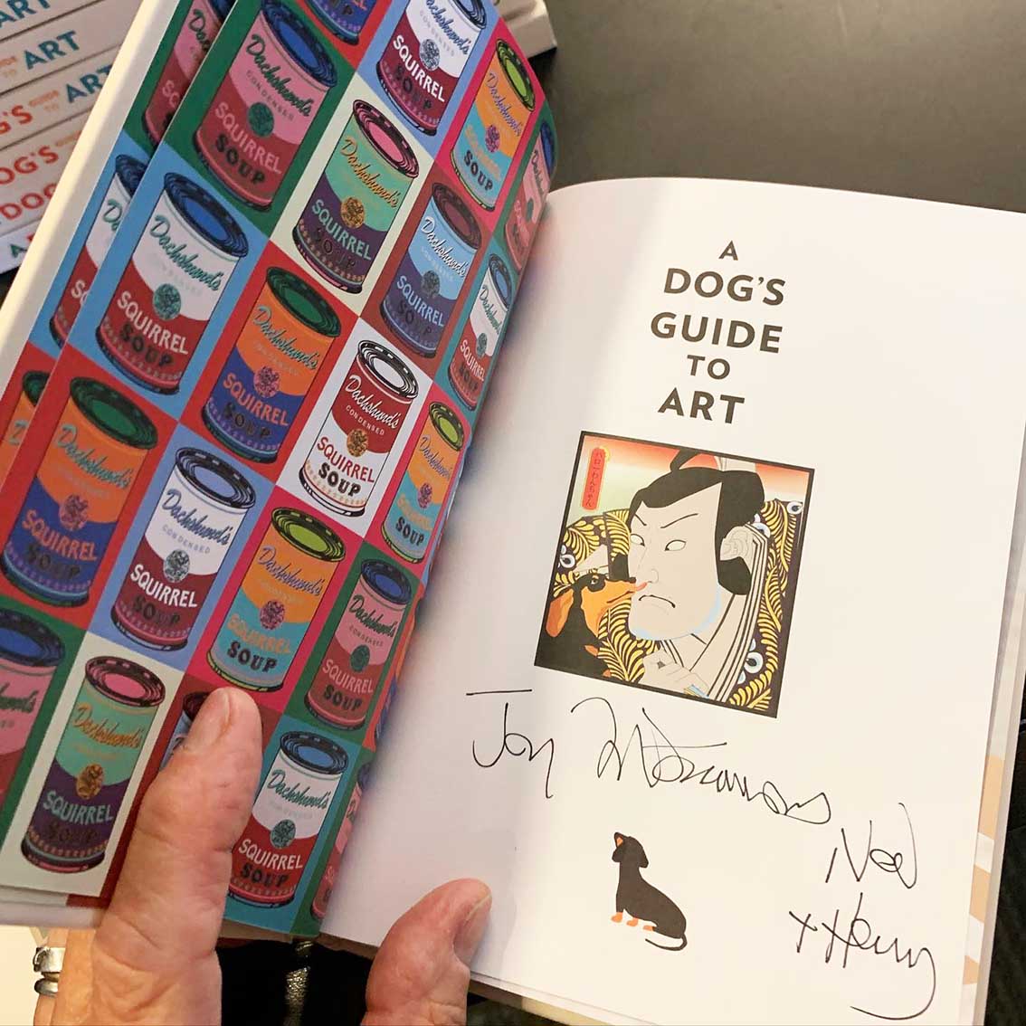 First page of the  book A Dogs Guide to Art with authors signature.